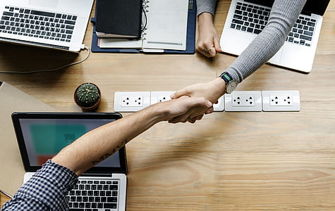 two people shaking hands thumbnail