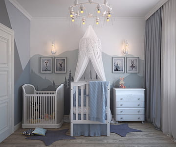 baby's white wooden crib beside crib and drawer chest thumbnail