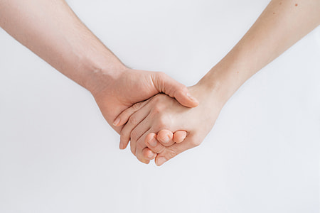 two hands holding each other thumbnail