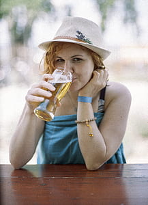 woman holding parfait glass shallow focus photography thumbnail