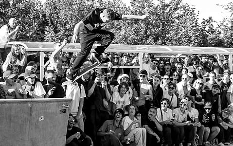 Grayscale Photography of Man Doing Ollie thumbnail