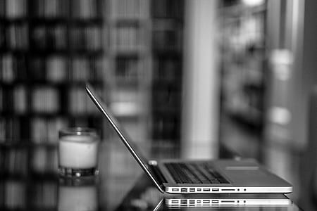 selective focus grayscale photography of opened laptop thumbnail