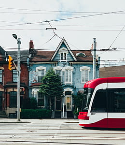 White and Red Cable Train in the Middle of the Street thumbnail