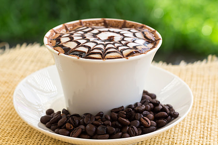 Cappuccino with spider web pattern thumbnail