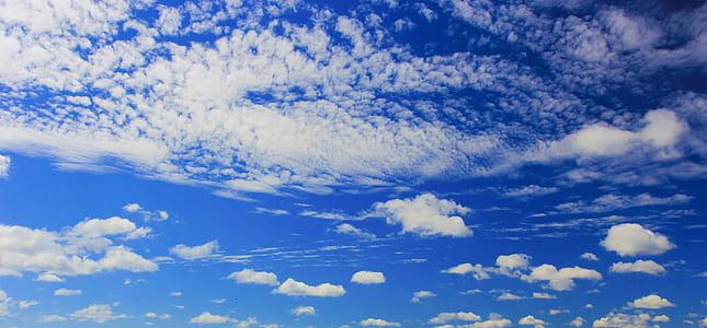 white clouds and blue sky thumbnail