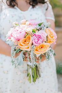 woman holding flower bouquet thumbnail