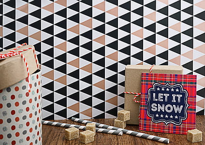 grey and white straw beside brown box thumbnail