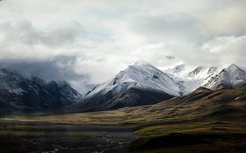 snow-capped mountain during daytime thumbnail