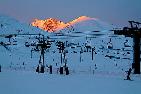 snow covered mountains during daytime thumbnail