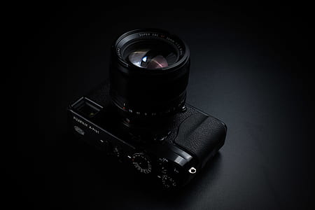 black DSLR camera thumbnail