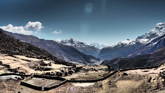 landscape photography of mountain under blue sky during daytime thumbnail