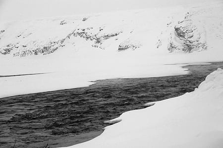 snowfield near river at daytime thumbnail