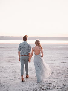 man and woman holding hands thumbnail