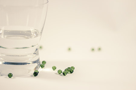 clear drinking glass on white surface thumbnail