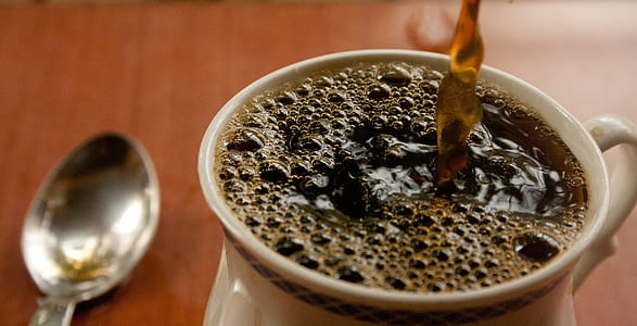 cup of coffee beside spoon thumbnail