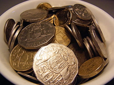 gold-colored coin lot in bowl thumbnail