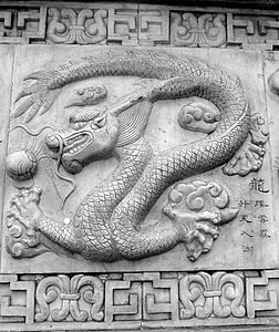 gray concrete carved dragon wall decor thumbnail