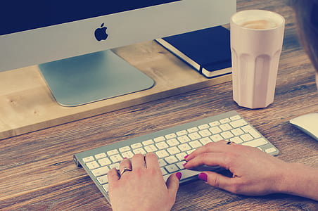 person typing on Cordless keyboard thumbnail