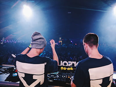 two DJ at middle of people thumbnail