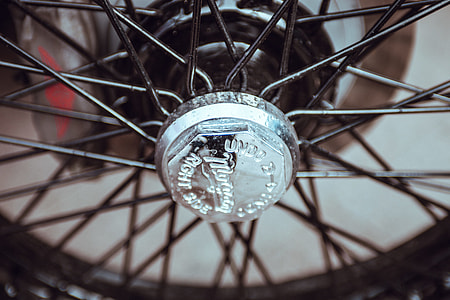 gray and black bike wheel selective focus photography thumbnail