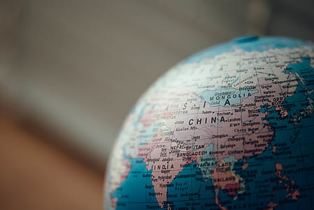 macro photography of world globe thumbnail