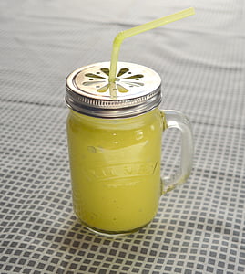 glass Mason jar filled with juice thumbnail