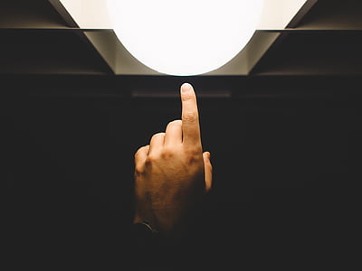 person showing left hand finger thumbnail