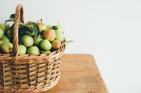 green apples in basket on table thumbnail