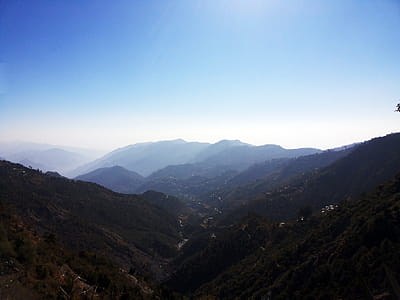 Mountain Range Under Blue Sky thumbnail