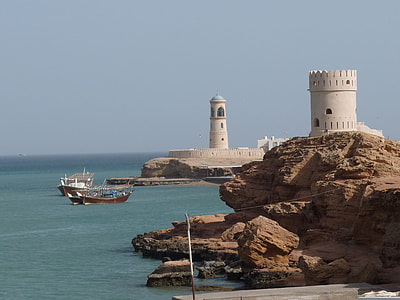 white watch tower near sea thumbnail