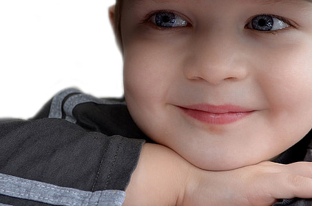 close-up photography of toddler thumbnail
