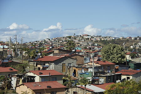 houses under blue sky at daytime thumbnail