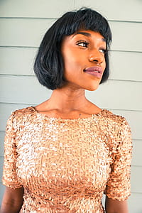 woman standing in front of wall thumbnail