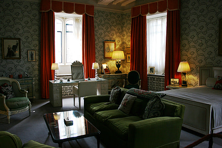 green 3-seat sofa inside room thumbnail