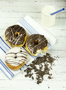Three Assorted Donuts With Milk thumbnail