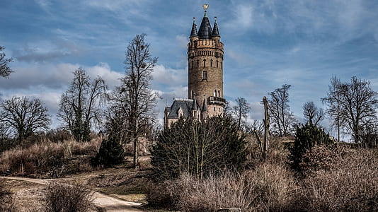 architectural photography of brown castle thumbnail