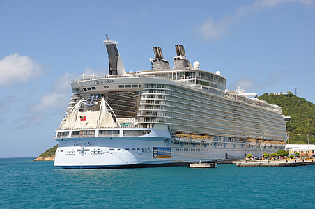 white cruise ship beside shore thumbnail