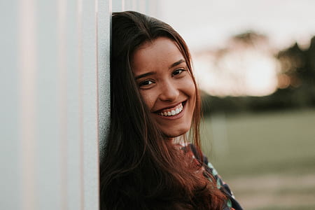 woman smiling at the photo thumbnail