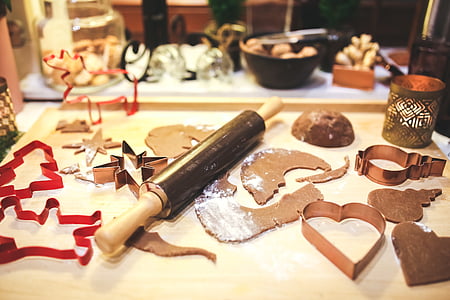 brown rolling pin on top of beige surface thumbnail