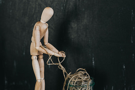 Wooden mannequin in various poses thumbnail