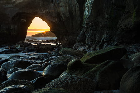 body of water surrounded by rocks thumbnail
