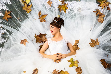 woman wearing white wedding gown posing for photo thumbnail