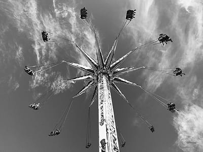 grayscale low-angle photography of a carnival ride thumbnail