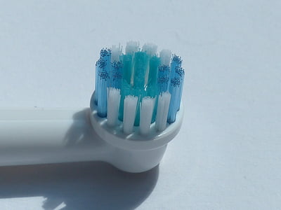 white and blue toothbrush thumbnail