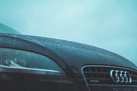 black Audi vehicle under cloudy sky thumbnail