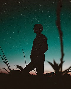 silhouette of man standing outdoor thumbnail