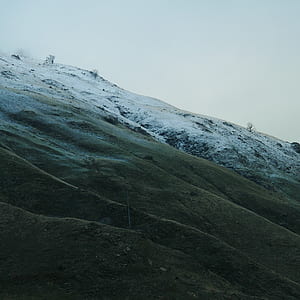 land formation under white sky thumbnail