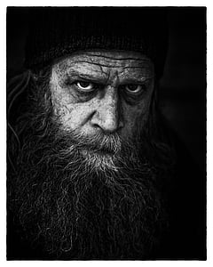 man wearing knit cap grayscale portrait thumbnail