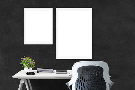 white and black armchair and white wooden desk thumbnail