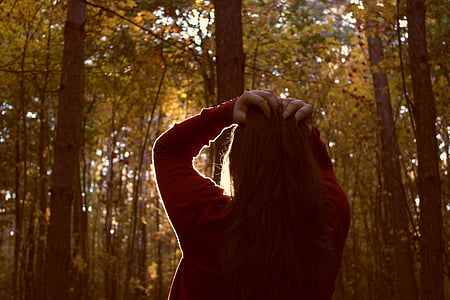 photography of woman holding her hair thumbnail